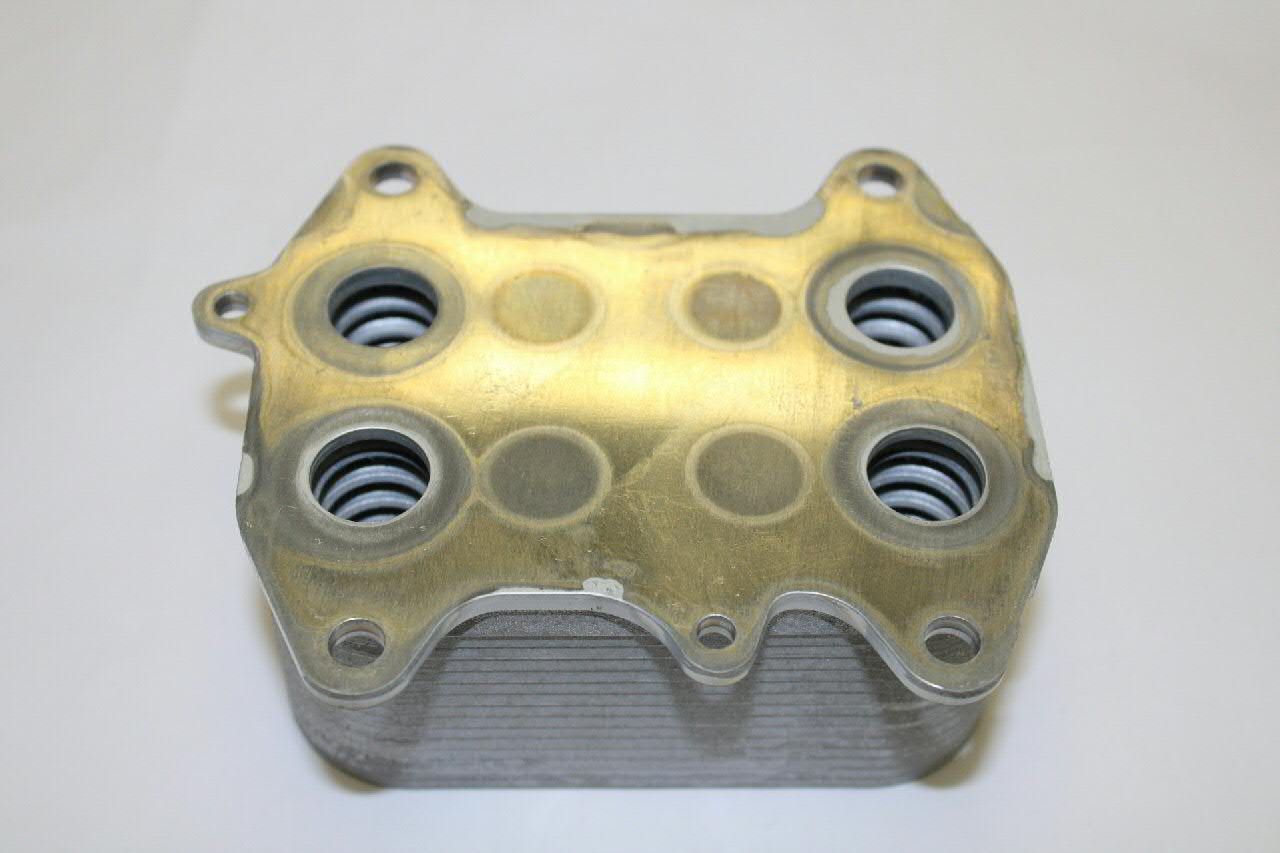 03L117021C VAG Radiador de aceite debajo del filtro
